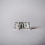 The dollar climbed to a four-week high.