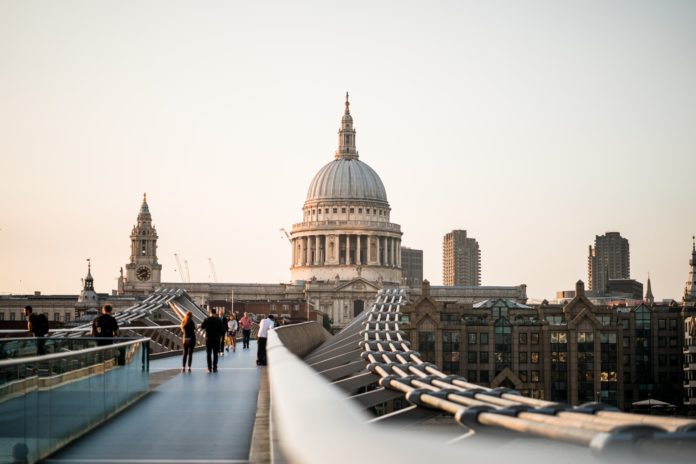 London (2) The pound held above the $1.20 a pound level. The island's currency was helped by the Bank of England's rise in base interest rates.