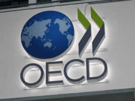 OECD: A global corporate tax rate could yield much more than originally estimated