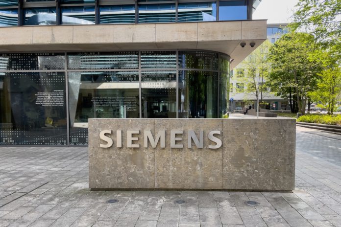 MunichGermany-May10th2022SiemensSignInMunich German industrial conglomerate Siemens is investing two billion euros (CZK 47.6 billion) in a global production increase.