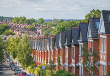 British economy fell in the fourth quarter, falling into recession Row of British terraced houses.