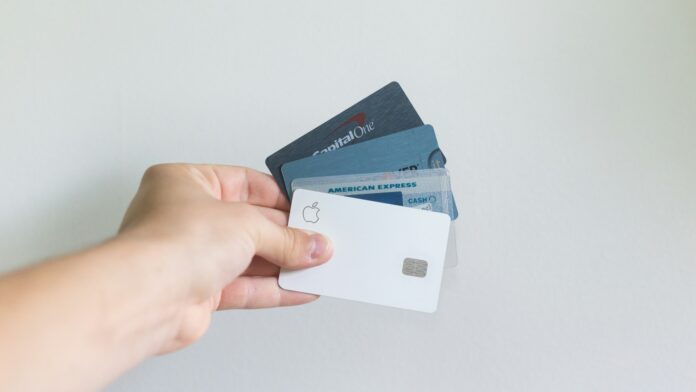 capital one Credit cards, american, capital one, hand holding cards.