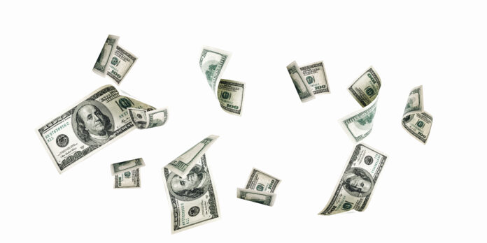 Hundred dollar bill Falling money isolated on white background American cash dollars
