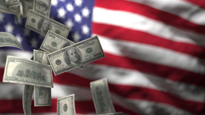 Falling Hundred Dollar Bills Against a Blurred American Flag Representing Economic Volatility and Potential Financial Instability in the United States USA